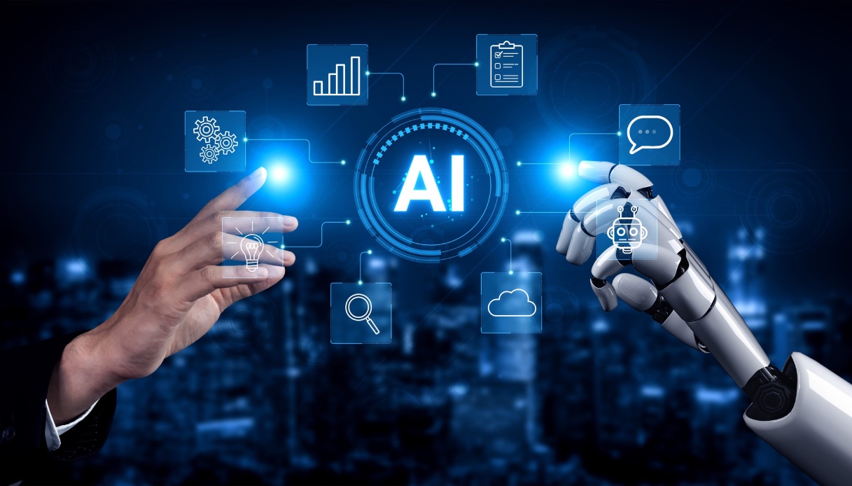 https://wips.plug.it/cips/tecnologia/cms/2026/08/mano-umana-e-robotica-vicino-simbolo-ai.jpg