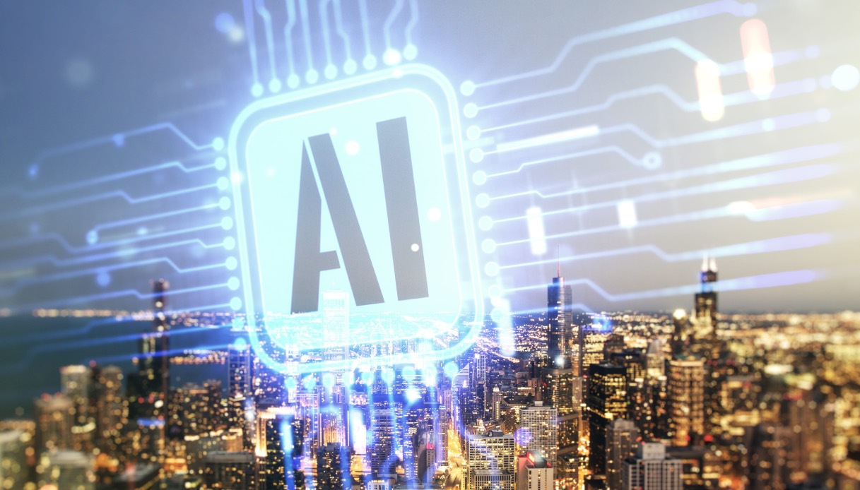 https://wips.plug.it/cips/tecnologia/cms/2026/09/simbolo-ai-sfondo-metropoli.jpg