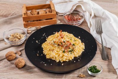 Risotto di zucca noci e speck