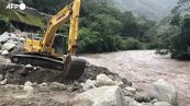 Piogge torrenziali in Peru', operai e abitanti al lavoro nelle zone alluvionate