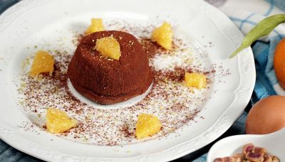 Tortini al cioccolato, profumo di arancia e pistacchi