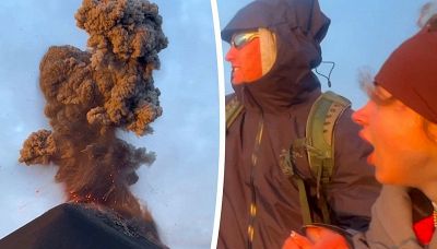 Escursionisti schivano rocce incandescenti durante l'eruzione del vulcano
