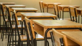 Lecture room or School empty classroom with desks and chair iron wood in high school thailand, interior of