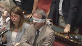 È no all'uso delle chat di Delmastro, è bagarre alla Camera