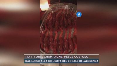 Piatti oro, champagne, pesce costoso