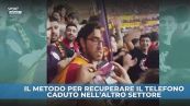 Gala, telefono cade nell'altro settore: recuperato con una sciarpa