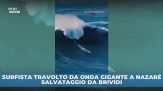 Surfista travolto da onda gigante, salvato in extremis