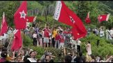 Turisti cinesi partecipano alla rievocazione della Lunga Marcia di Mao
