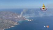 In fuga dalle fiamme, piogge al centronord