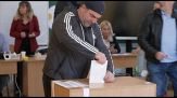 Romania al voto, sfida tra il populista Simion e l'europeista Dan